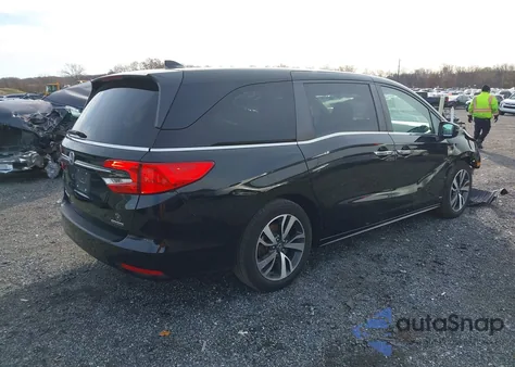 2022 Honda Odyssey Touring z USA, uszkodzony, nr VIN 5FNRL6H8XNB005937